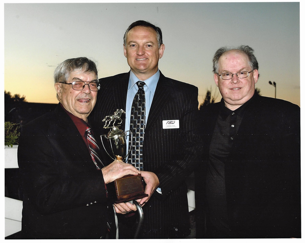 L to R: 1958 Gold Cup-winning jockey Ray Stewart, Assiniboia Downs CEO Darren Dunn and Track Historian Bob Gates