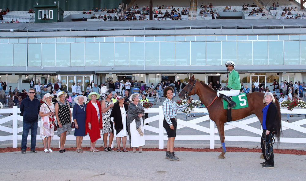 Burn Jakey Burn in the winner’s circle after winning the second race on Wednesday, In Honour of David Blake, for trainer Wendy Anderson. Ronald Ali up. (Jason Halstead / Assiniboia Photo)