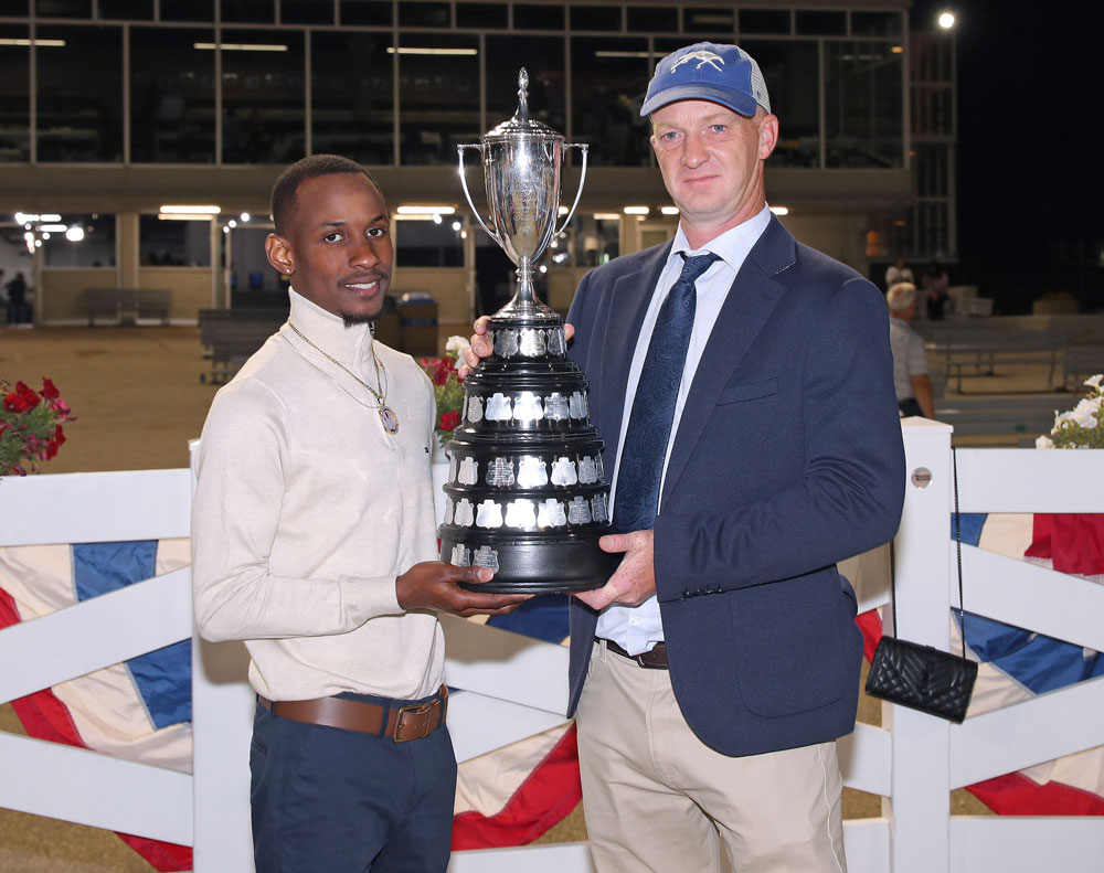 RobertCraigSmithandBrianBoodramsingh1k Manitoba Derby-winning jockey N'Rico Prescod and trainer Craig Robert Smith with the Manitoba Derby trophy. (Jason Halstead / Assiniboia Photo)