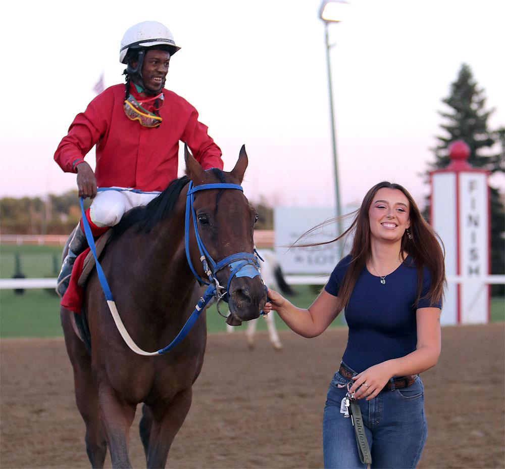Designated Hitter and Javaniel Patterson are led into the winner’s circle after winning the third race on Wednesday. (Jason Halstead / Assiniboia Photo)